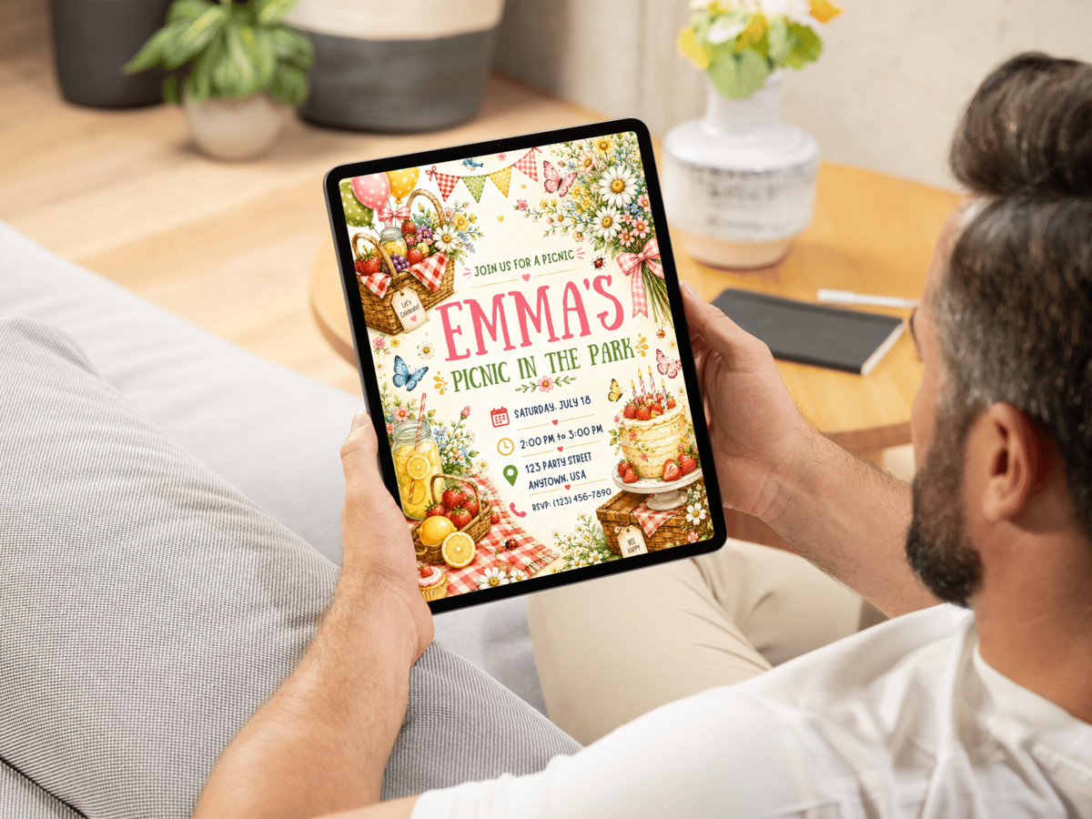 Watercolor picnic birthday invite with floral garden imagery, butterflies, strawberries, lemonade, gingham accents and a bright, playful design for any age.